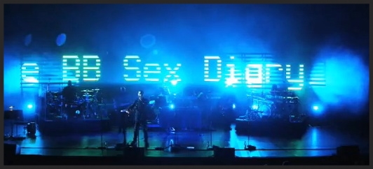 During live performances of Inertia Creeps, the LED screen broadcasts tadloid headlines from the same day as each show.